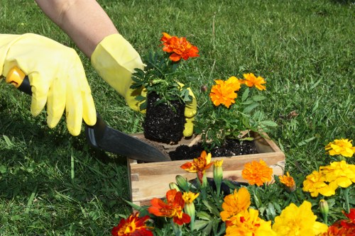 Residents separating garden and kitchen waste at a recycling station